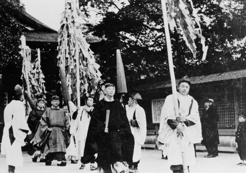Procession of Shinto priests and assistants heading to Yasaka Jinja Shrine (mid-twentieth century)