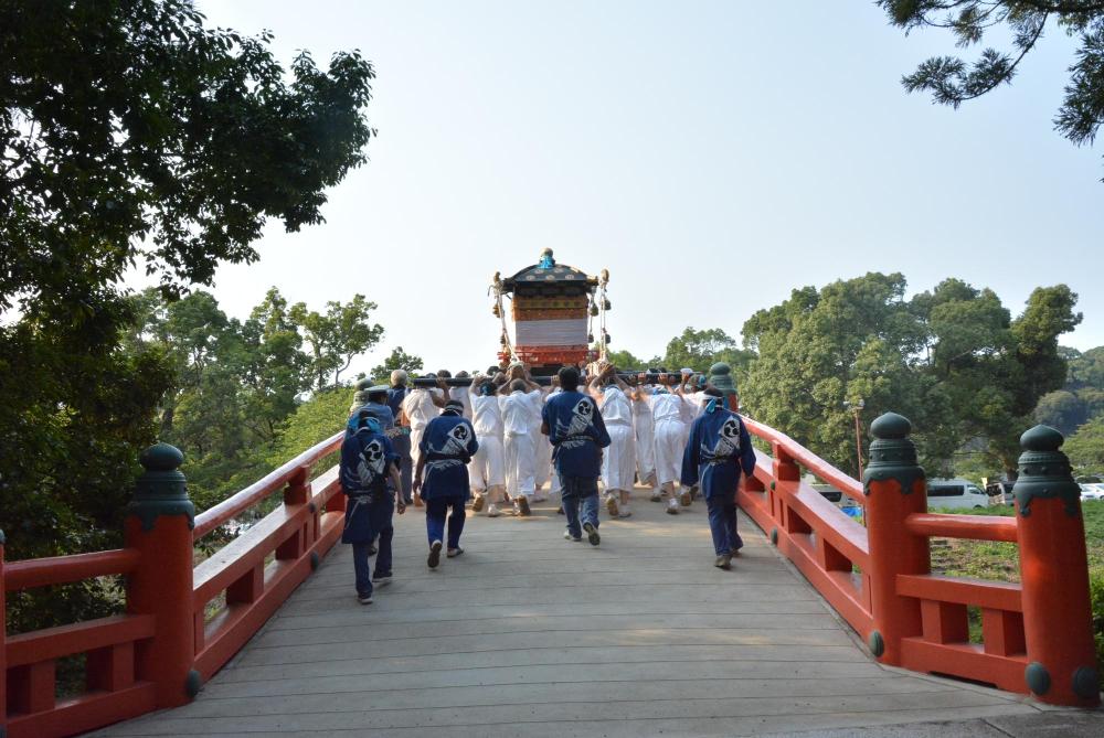 A portable shrine carried across the Shinkyo Bridge